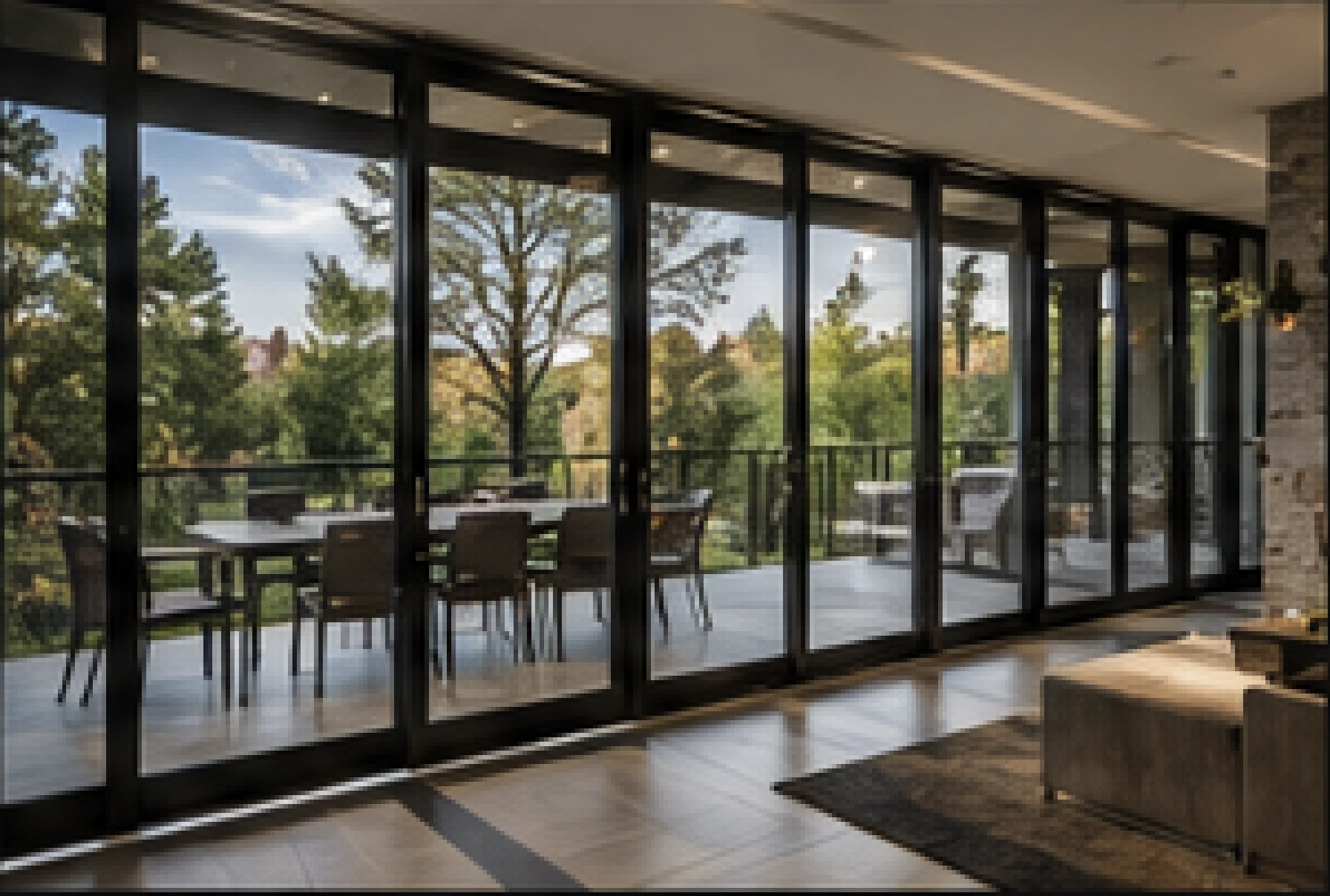 Large black-framed luxury windows and sliding doors